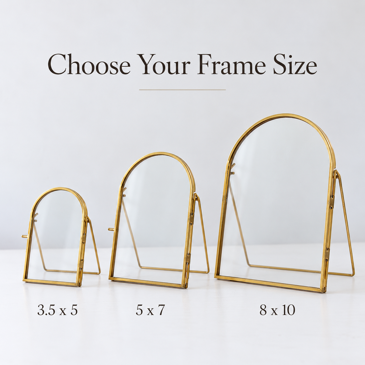Three gold-framed arched mirrors in different sizes labeled 3.5 x 5, 5 x 7, and 8 x 10, with the text 'Choose Your Frame Size' above on a clean white background.