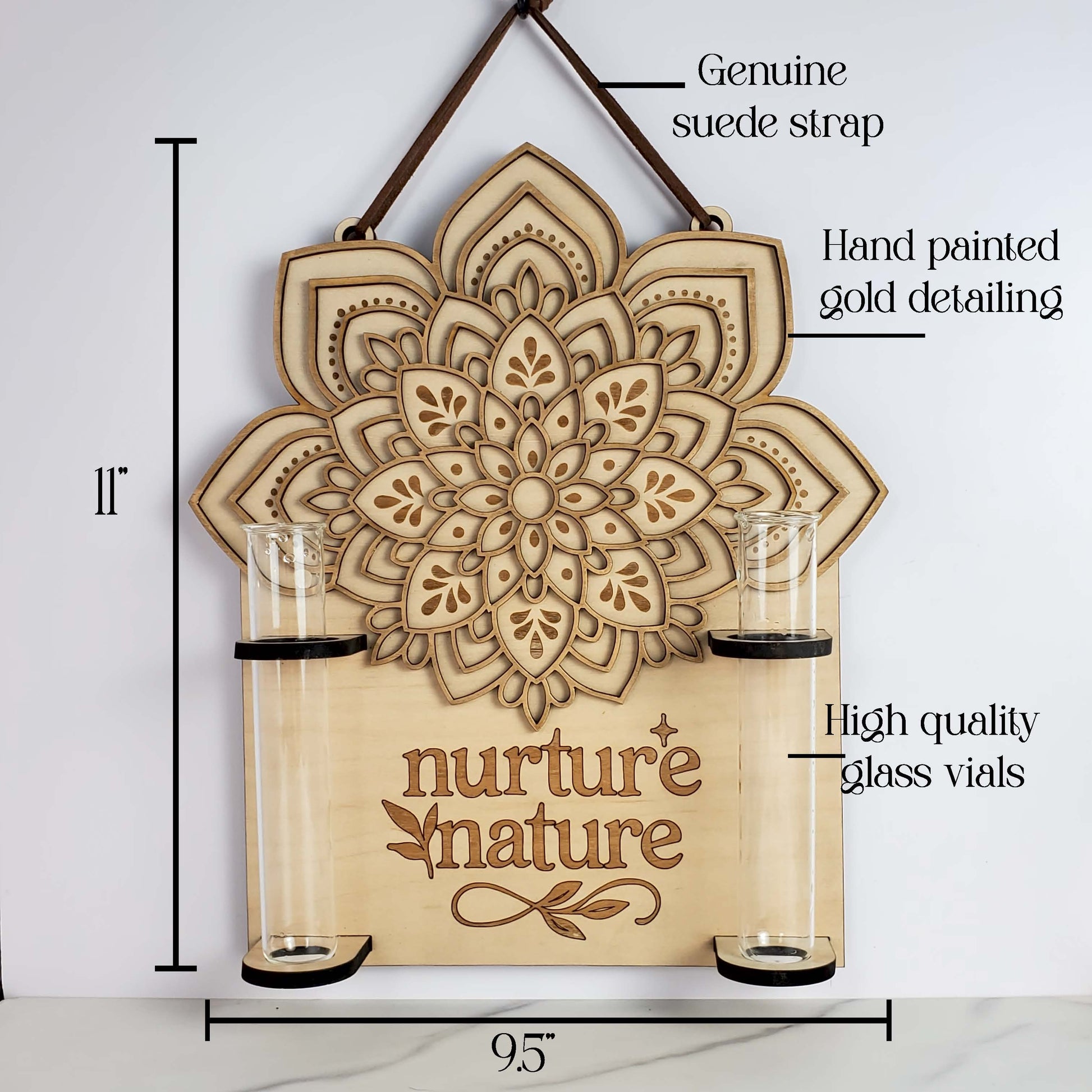 Mandala wall propagation station engraved “nurture nature,” made from layered maple wood with genuine suede hanging strap, hand-painted gold detailing, and two high-quality 6.25-inch by 1-inch glass vials; graphic shows approximate dimensions 11 inches tall by 9.5 inches wide.