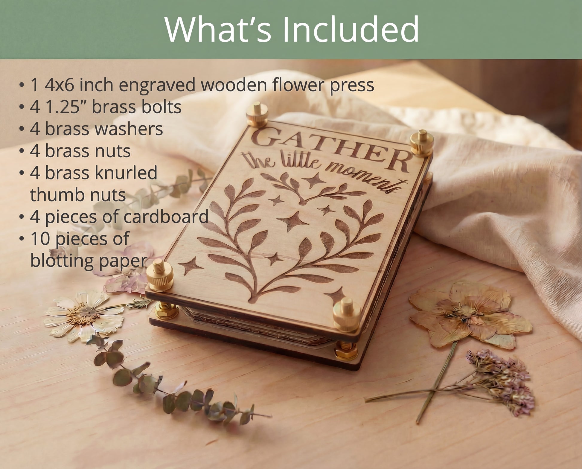 “What’s Included” graphic showing a 4x6 engraved wooden flower press kit with brass bolts, washers, nuts, knurled thumb nuts, cardboard layers, and blotting paper beside the maple flower press on a wood table with linen and pressed flowers.