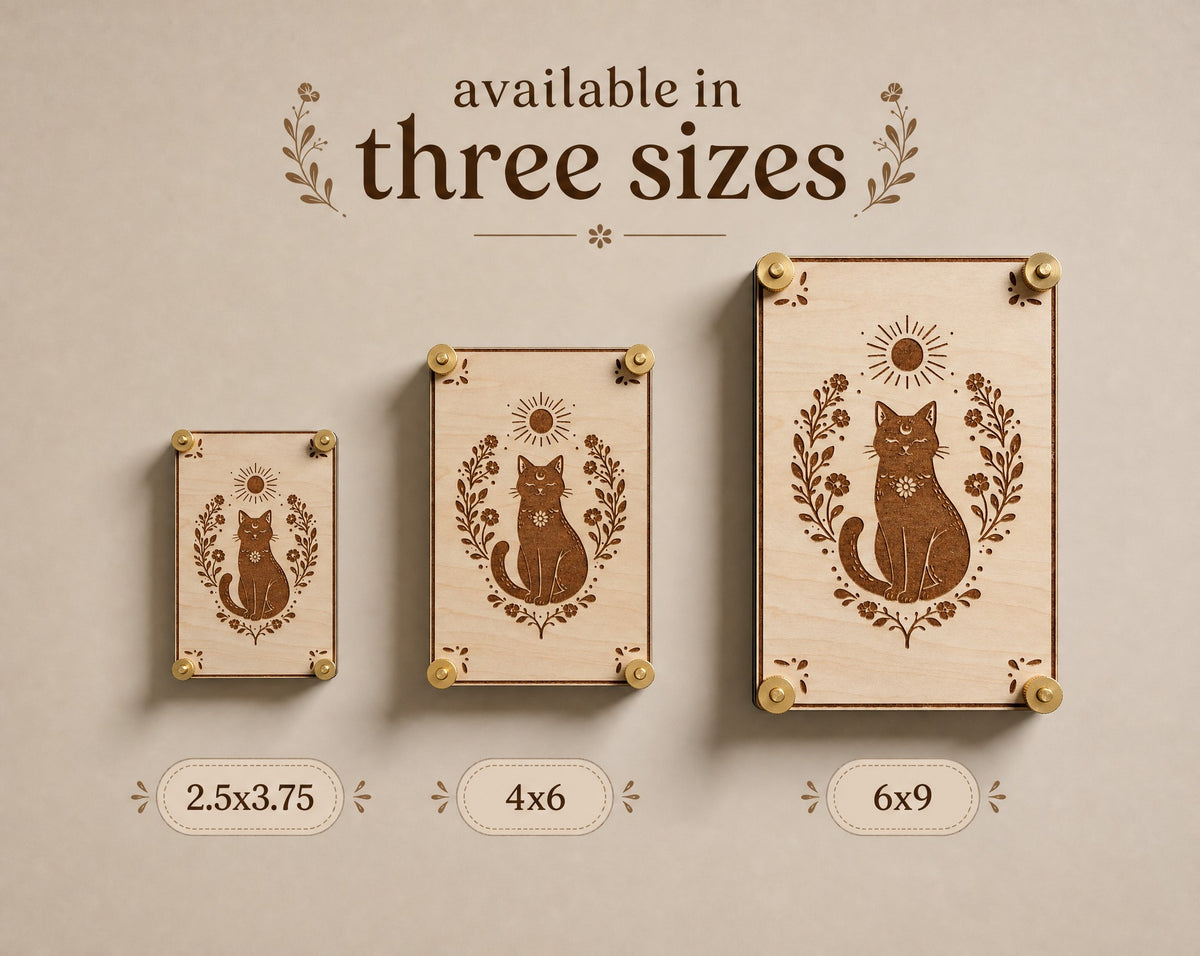Three sizes of handcrafted wooden flower presses featuring an engraved black cat with botanical florals and a sun motif. Shown in mini (2.5 x 3.75 inches), standard (4 x 6 inches), and large (6 x 9 inches), each finished with brass hardware.