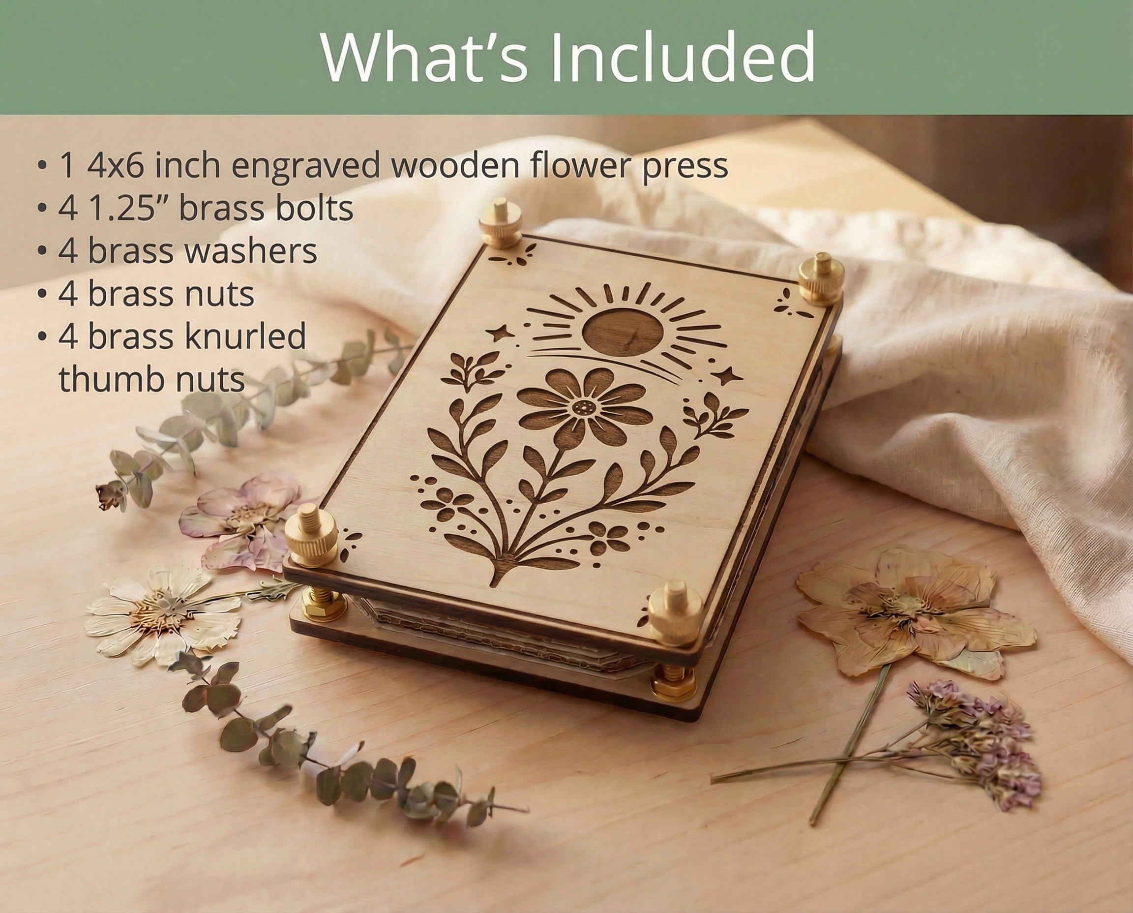 Graphic showing “What’s Included” for a 4x6 engraved wooden flower press kit, listing four 1.25-inch brass bolts, four brass washers, four brass nuts and four brass knurled thumb nuts, with the assembled maple flower press pictured on a light wood table with dried flowers and eucalyptus.
