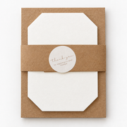 Precut white cotton blotting paper refill for a wooden flower press, packaged with kraft paper band and thank you sticker.