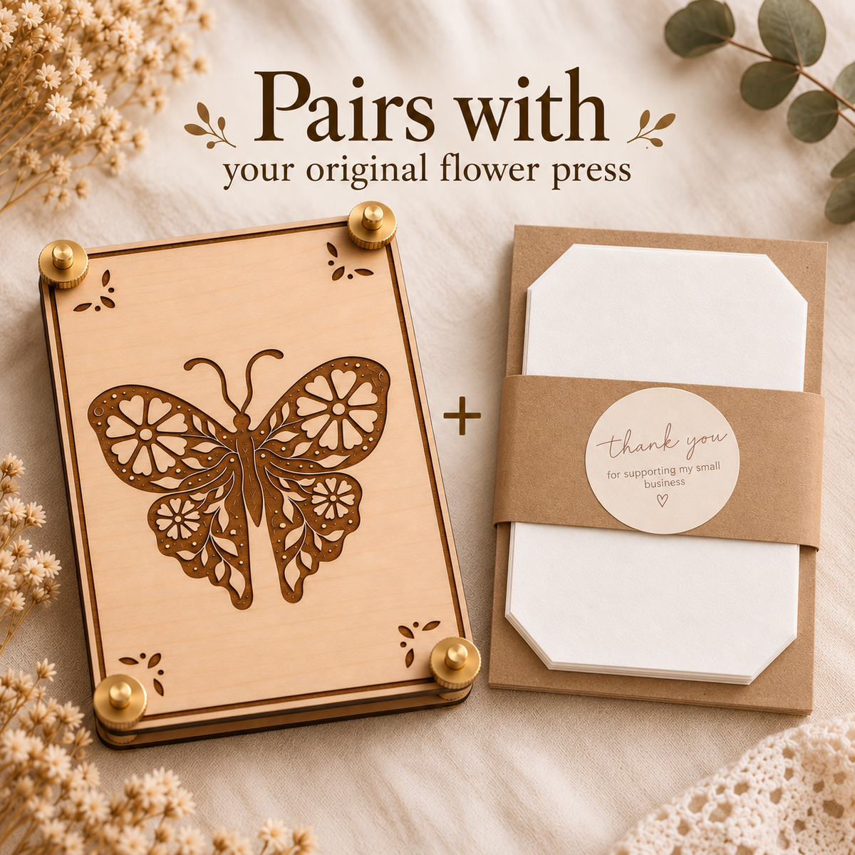 Wooden butterfly flower press paired with precut blotting paper refill sheets for replacing used flower pressing paper.